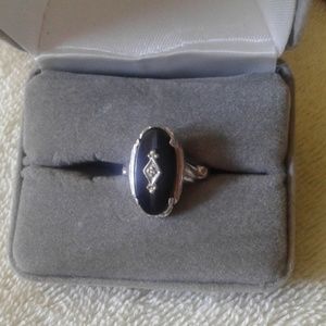 Black onyx ring, with small diamond chip in center